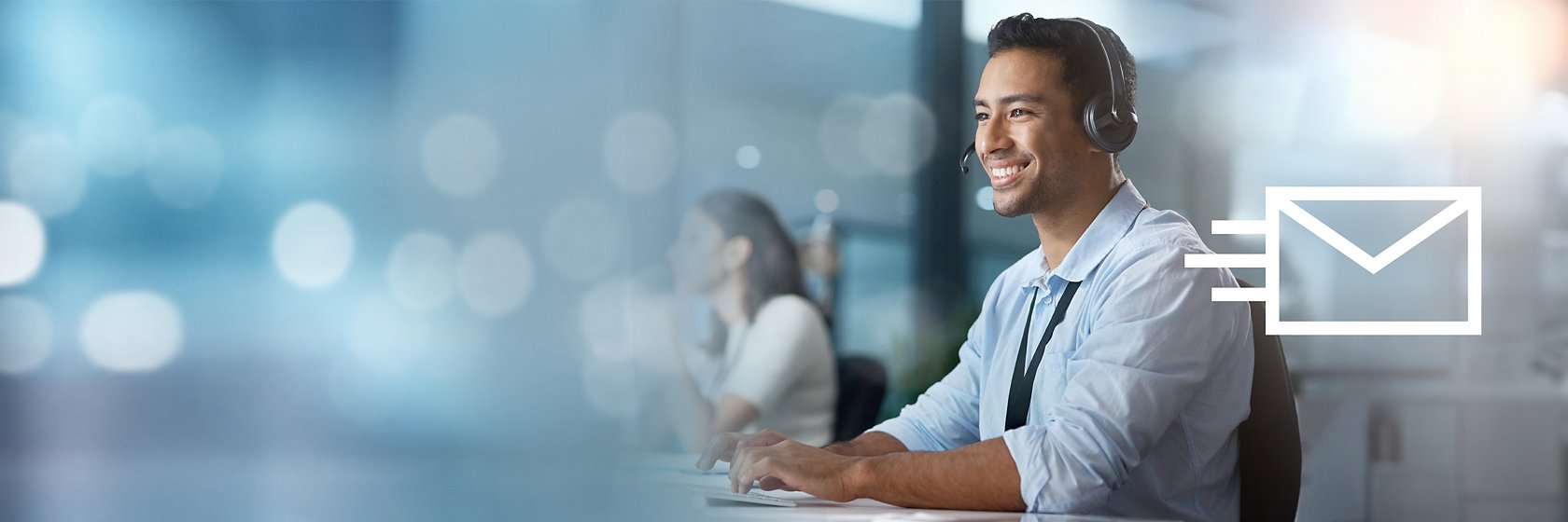 Guy in blue shirt with headset. 