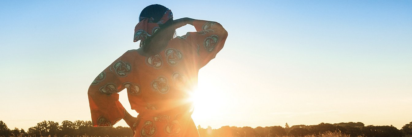 Woman looking at the sun